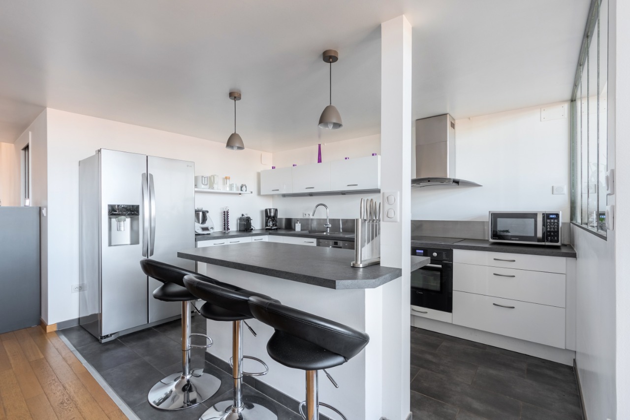 Loft triplex 4 chambres 1 bureau  une loggia de 28m Photo 4 - Paris Lille Immobilier