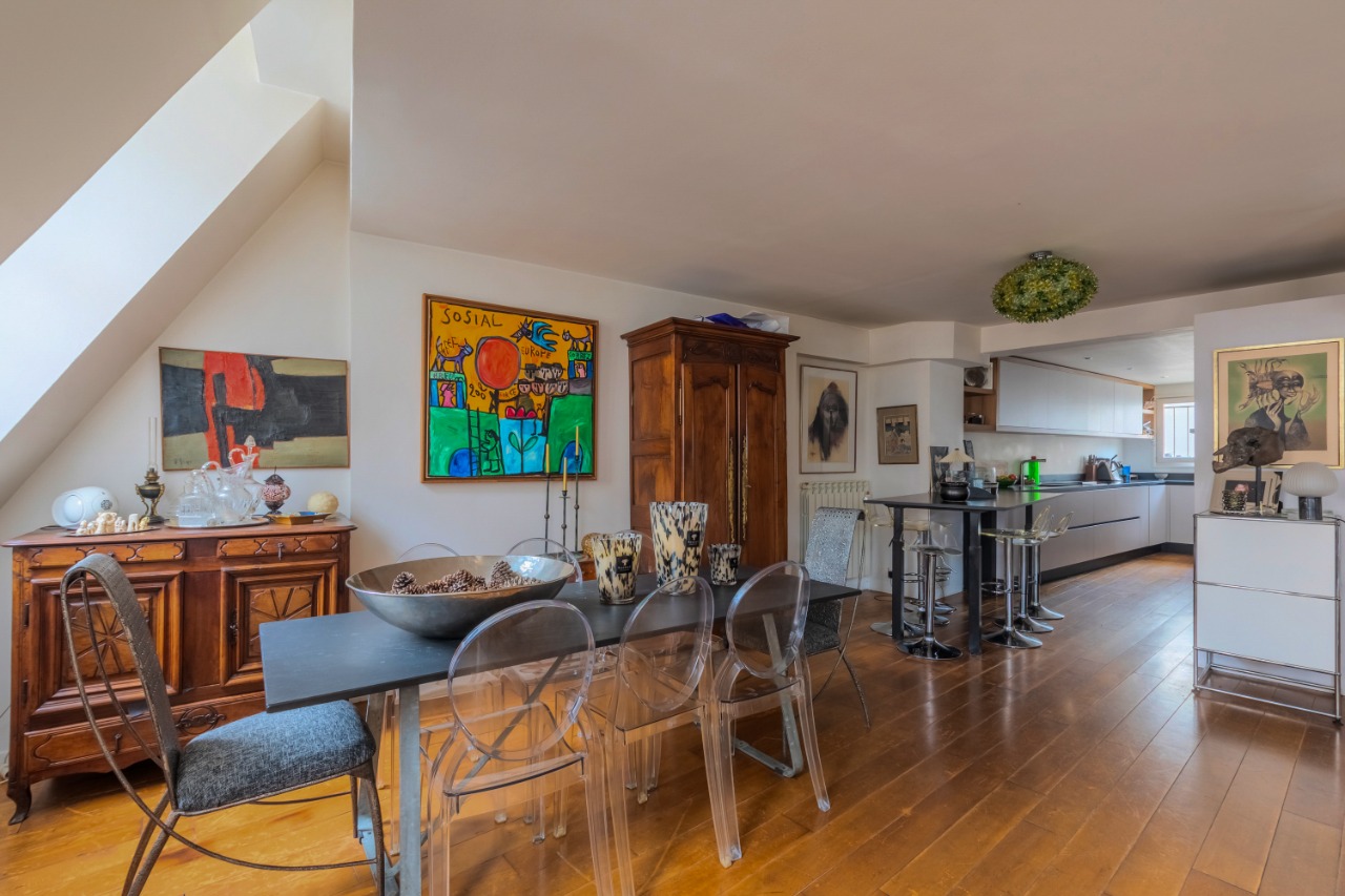 Rare appartement deux chambres et terrasse en rooftop  Photo 3 - Paris Lille Immobilier