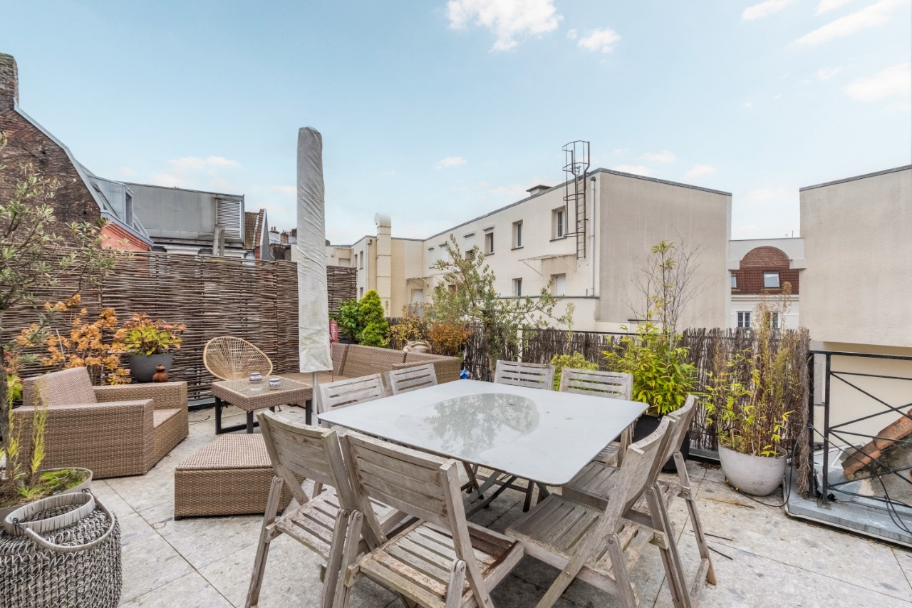 Rare appartement deux chambres et terrasse en rooftop  Photo 9 - Paris Lille Immobilier