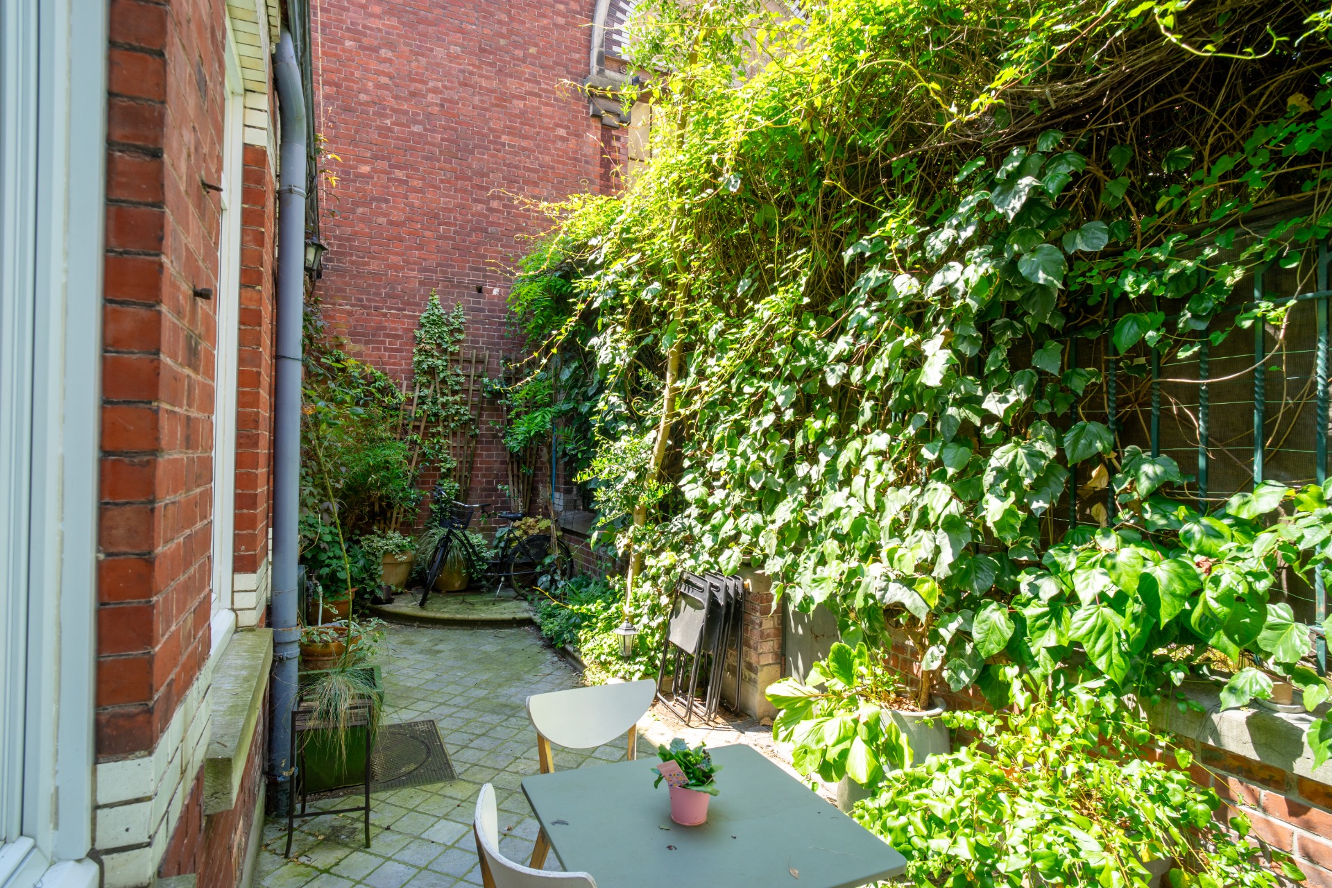 Superbe appartement rez-de-jardin avec cour Photo 9 - Paris Lille Immobilier